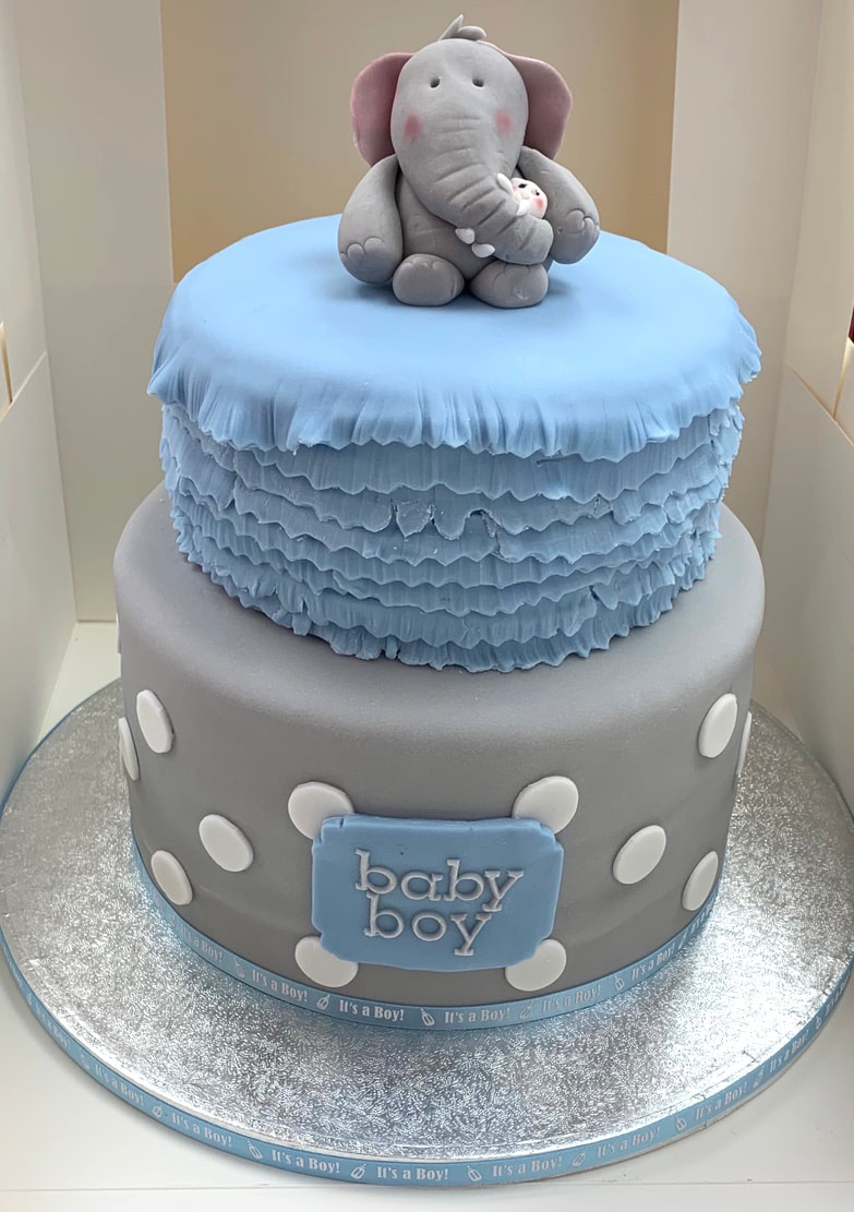 Meet the new baby boy christening cake made at sweet Things coleshill 