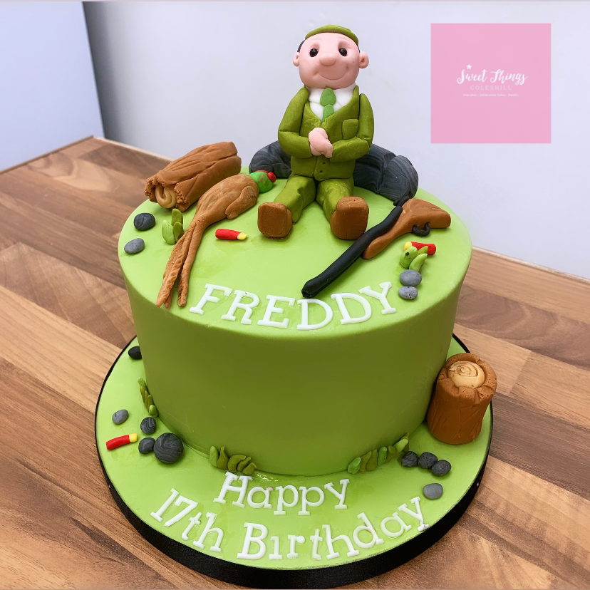 Shooting theme birthday cake made at sweet Things coleshill 